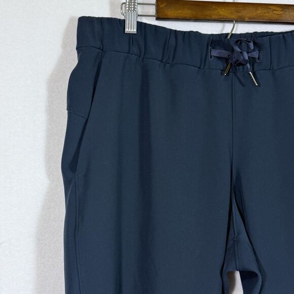 Lululemon On The Fly Woven 27" True Navy Crop Pull On Pants Womens 12 Athleisure - Picture 4 of 11